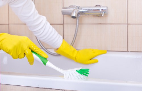 Technician treating a stain during commercial carpet cleaning